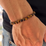 pulseira-lazare-com-pedra-natural-olho-de-tigre-e-cruz-em-hematita-ficha-tecnica